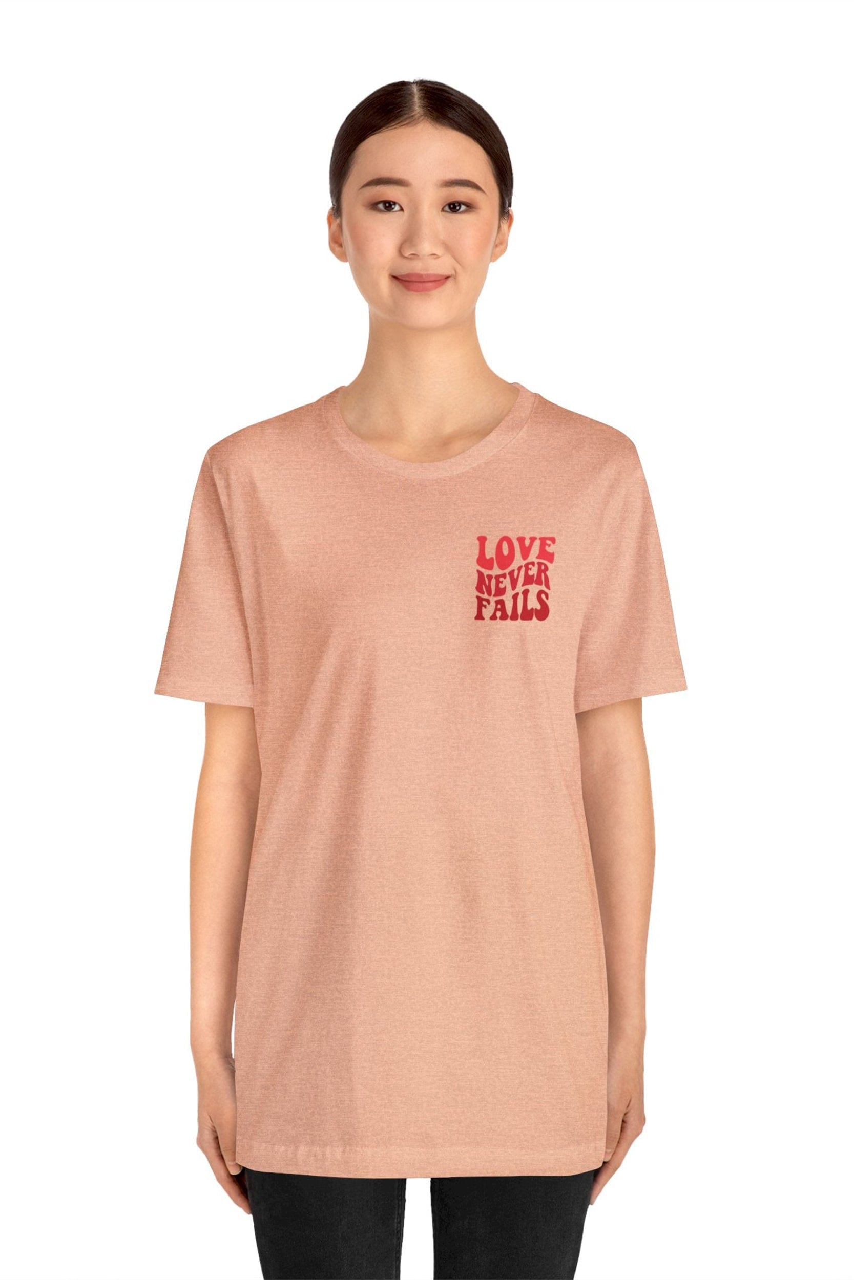 "LOVE NEVER FAILS" T-Shirt