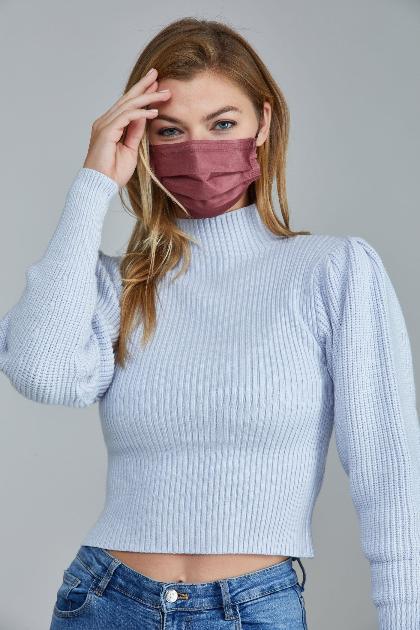 Woman wearing stylish Dark Red Pleated face mask, with high quality breathable fabric. 