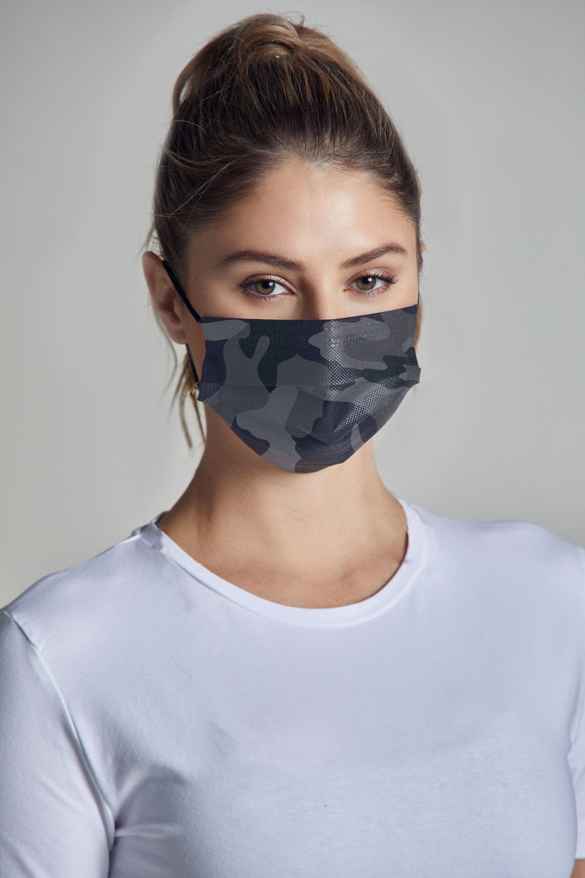 Woman wearing stylish Black Camo Printed Pleated face mask, with three layers & high quality breathable fabric. 