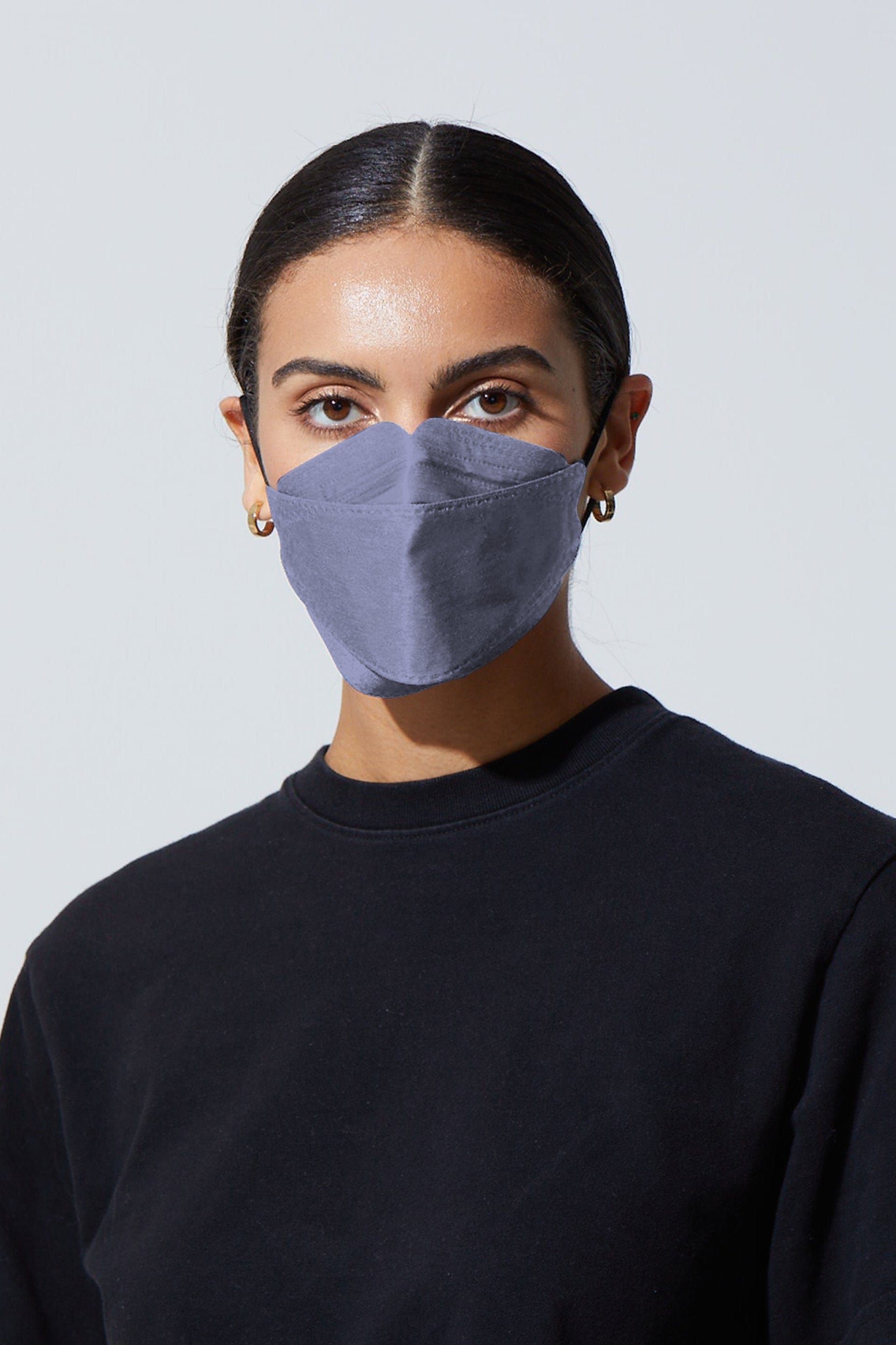Woman wearing stylish Light Purple KF94 face mask, with high quality breathable fabric. 
