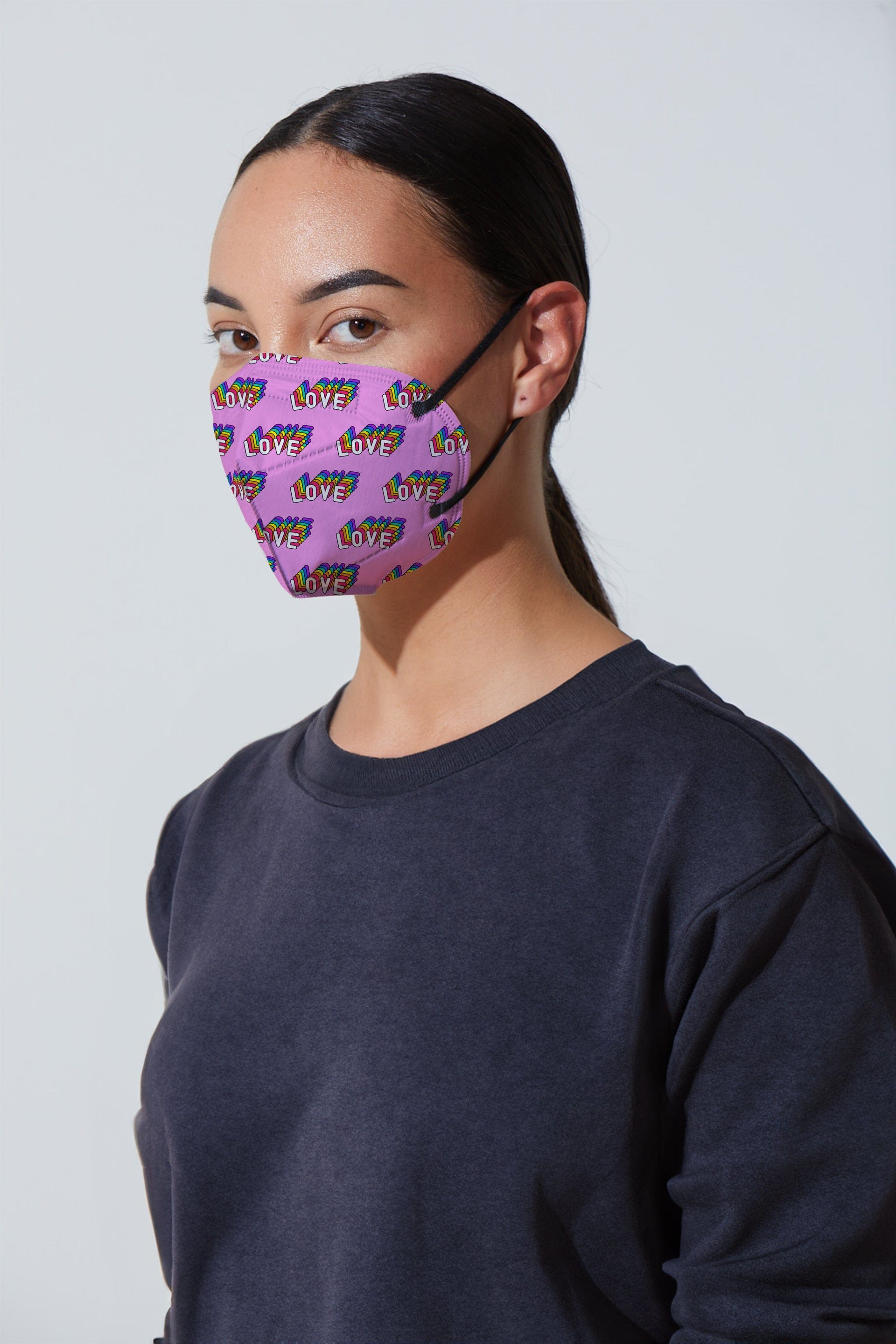 Woman wearing stylish Love Printed Light Purple KN95 face mask, with high quality breathable fabric. 